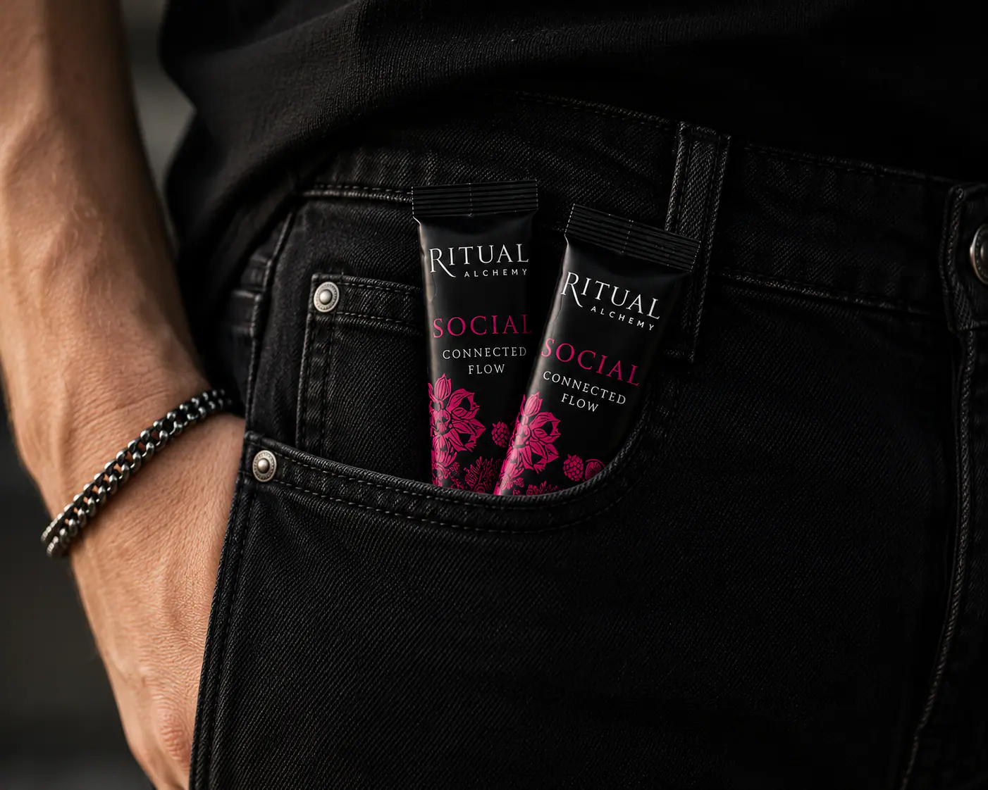 A Ritual Alchemy sachet tucked into a jacket pocket